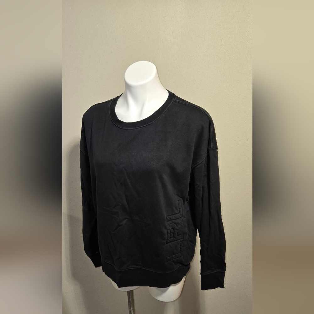 Black Crewneck Sweater with Long Sleeves and Smooth Texture